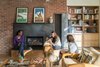 Modern home with Living Room, Coffee Tables, Chair, Medium Hardwood Floor, and Gas Burning Fireplace. Living Room fireplace and built-in. Built-in was custom made by AvenueTwo:Design. Fireplace surround is hotrolled steel by Gulley Metal Services. Photo 11 of Langley_Hawthorne Residence