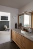 Modern home with Bath Room, Engineered Quartz Counter, Ceramic Tile Floor, Undermount Sink, and Wall Lighting. Master Bathroom. Custom vanity and large mirror by AvenueTwo:Design. Caesarstone countertops. Photo 7 of Richthofen Residence
