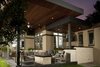 Modern home with Outdoor, Back Yard, Large Patio, Porch, Deck, Wood Patio, Porch, Deck, Concrete Patio, Porch, Deck, and Metal Patio, Porch, Deck. Living area with custom stone and concrete fireplace. Photo 4 of Hudson Patio