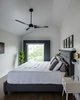 Modern home with Bedroom, Ceiling Lighting, Bed, Night Stands, and Medium Hardwood Floor. Master Bedroom Photo of Lawrence Street Residence