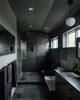 Modern home with Bath Room, Engineered Quartz Counter, Ceiling Lighting, Pendant Lighting, Porcelain Tile Floor, Undermount Sink, Full Shower, Stone Tile Wall, and One Piece Toilet. Master Bathroom Photo 2 of Lawrence Street Residence