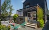 Modern home with Outdoor, Trees, Back Yard, Concrete Patio, Porch, Deck, Metal Patio, Porch, Deck, Metal Fences, Wall, Concrete Fences, Wall, and Landscape Lighting. Back patio and outdoor living room. Board form concrete fireplace Photo 7 of Lawrence Street Residence