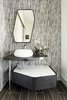 Modern home with Bath Room, Vessel Sink, Porcelain Tile Floor, Wood Counter, and Ceramic Tile Wall. Powder room vanity from Porcelanosa with floor to ceiling tile. Photo 9 of Hilltop Residence