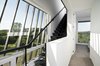 Modern home with Staircase, Metal Tread, and Metal Railing. Stairs to rooftop deck/guest bedroom Photo 7 of The Sleeve House
