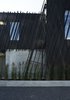 Modern home with Exterior, Wood Siding Material, and House. East façade Photo of The Sleeve House