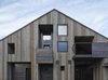 Modern home with Exterior, Wood Siding Material, Metal Siding Material, House Building Type, and Glass Siding Material. Exterior Photo of House in Duhanino