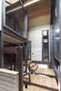 Modern home with Staircase, Metal Railing, and Wood Tread. Interior Photo 14 of House in Duhanino