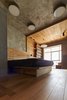 Modern home with Bedroom, Bed, Ceiling Lighting, Pendant Lighting, Medium Hardwood Floor, and Storage. Master bedroom Photo of 57 Drawers