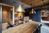 Modern home with Dining Room, Table, Chair, Ceramic Tile Floor, Lamps, Ceiling Lighting, Pendant Lighting, and Medium Hardwood Floor. Dining room Photo 6 of 57 Drawers