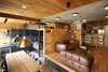 Modern home with Living Room, Ceiling Lighting, Pendant Lighting, Accent Lighting, Medium Hardwood Floor, Ceramic Tile Floor, Sofa, Coffee Tables, and Bookcase. Living and dining rooms Photo 4 of 57 Drawers