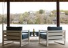 Modern home with Back Yard, Hardscapes, Grass, Shrubs, Trees, Walkways, Large Patio, Porch, Deck, Stone Patio, Porch, Deck, Landscape Lighting, Metal Fences, Wall, Swimming Pools, Tubs, Shower, Standard Construction Pools, Tubs, Shower, Ceiling Lighting, Recessed Lighting, Medium Hardwood Floor, Sectional, Coffee Tables, Console Tables, Chair, and Ottomans. Pair of Aegean aluminum collection lounge chairs and ottoman from Restoration Hardware paired with side table from CB2 over looking Lake Austin. Photo 6 of Lake Austin Remodel