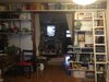 Modern home with Bedroom, Bookcase, Shelves, Medium Hardwood Floor, Chair, Ceiling Lighting, and Pendant Lighting. Bookshelf wall Photo 3 of The Place Under the Stairs