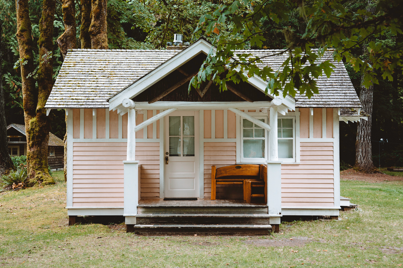 The Simple Cabin:

When I was a kid I used to draw houses as a rectangle with a door, one window and a triangle roof on top. I'm wondering who got their hands on those blueprints...