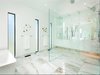 Master Bathroom featuring a three sided barrier free glass shower Photo 3 of Zimmerman Place modern home