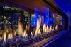 Modern home with Dining Room, Gas Burning Fireplace, and Two-Sided Fireplace. Always clean, always modern. Robust flames dance atop black quartz fire media. Photo 5 of Kona Grill
