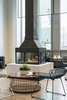 Modern home with Dining Room and Gas Burning Fireplace. Its 4-sided design completes the modern and warm feel of the cafe. Architect, David Hacin told us he wanted this space to be inviting, with a similar feel to your living room. It’s a space where you can really spread out and make yourself at home. Photo 4 of Flour Bakery