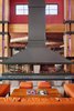 Modern home with Living Room, Table, Gas Burning Fireplace, Carpet Floor, Sectional, Two-Sided Fireplace, Sofa, and Coffee Tables. Z-Group Architects and Crystal Springs Builders worked closely to bring such a unique design to life. Photo of The Inn at Aspen