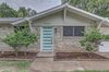 Front of house. Photo of East Side Mid-Century modern home