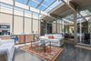 Modern home with Windows, Metal, and Skylight Window Type. A sunlit atrium with the Rollamatic Roof Photo 4 of Sunnyvale Eichler Remodel