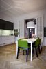Modern home with Living Room, Floor Lighting, Chair, Light Hardwood Floor, and Sofa. The dining room and open kitchen Photo 2 of Maison de Maitre - Brussels