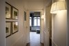 Modern home with Hallway and Light Hardwood Floor. View on the corridor Photo 11 of Maison de Maitre - Brussels