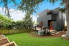 The rear of the Monolith highlights more of the house's angles with the custom Hogwire railing on the patio. Photo 3 of The Monolith modern home