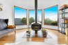 Original drum fireplace and views of shipping canals. Photo 5 of The Monolith modern home