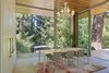 Modern home with Dining Room, Table, Porcelain Tile Floor, Ceiling Lighting, Pendant Lighting, and Chair. Dining Photo 6 of The TORO House