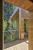 Modern home with Exterior, Wood Siding Material, Metal Roof Material, Flat RoofLine, and House Building Type. Exterior walk Photo 10 of The TORO House