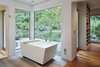 Modern home with Engineered Quartz Counter, Ceiling Lighting, and Undermount Sink. Master Bath Photo 14 of The TORO House
