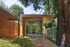Modern home with Exterior, Flat RoofLine, Wood Siding Material, Metal Roof Material, and House Building Type. Front Entry. Photo of The TORO House