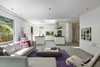 Modern home with Living Room, Porcelain Tile Floor, Sectional, Recliner, Bookcase, Coffee Tables, Sofa, and Ceiling Lighting. Kitchen and Family Photo 5 of The TORO House