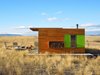 Modern home with Exterior, House Building Type, Metal Roof Material, Metal Siding Material, and Wood Siding Material. Side Elevation Photo 9 of Little Box on the Prairie