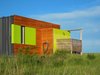 Modern home with Exterior, Wood Siding Material, House Building Type, Metal Roof Material, and Metal Siding Material. Outdoor shower Photo 14 of Little Box on the Prairie