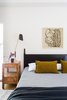 Modern home with Bedroom, Wall Lighting, Bed, Medium Hardwood Floor, and Night Stands. Master bedroom Photo 14 of Dundee Residence
