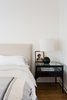 Modern home with Bedroom, Bed, Table Lighting, Night Stands, and Medium Hardwood Floor. Guest bedroom Photo 18 of Dundee Residence