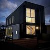 Modern home with Exterior, House Building Type, Green Roof Material, and Metal Siding Material. Rear Facade, from parking off the alley Photo 5 of T32 North Park Home
