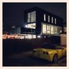 Modern home with Exterior, Green Roof Material, and Metal Siding Material. Night view from sidewalk Photo 4 of T32 North Park Home