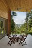 Modern home with Outdoor, Concrete Patio, Porch, Deck, and Trees. view from the porch to the Potomac River Photo 6 of Ridge House