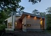 Modern home with Exterior, Wood Siding Material, Metal Roof Material, Metal Siding Material, and House. view from the northwest at dusk
Photo 9 of Ridge House