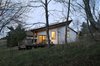 view from the west at dusk Photo 4 of Highland House modern home