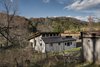 view from the south with goat barn in the foreground Photo 5 of Highland House modern home