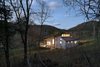 view from the southwest at dusk Photo 19 of Highland House modern home