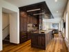 Modern home with Sliding Door Type, Exterior, Casement Window Type, and Staircase. Custom metal ceiling defines kitchen Photo 12 of Taphouse