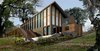 Modern home with Outdoor, Trees, Wood Patio, Porch, Deck, Front Yard, and Shrubs. Exterior Rendering Photo of River House