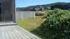 Modern home with Outdoor, Side Yard, Shrubs, and Small Patio, Porch, Deck. Prior to courtyard extension: View of original side yard to east. Photo 3 of Abalone Bay