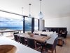 Dining and living room overlooking ocean Photo 8 of House On The Point modern home