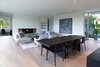 Modern home with Living Room, Light Hardwood Floor, and Wood Burning Fireplace. Living / Dining Photo 4 of Orchard House