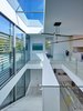 Modern home with Living Room. Stairs to upper level office/media room Photo 5 of Dune Crest