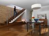 Modern home with Dining Room, Table, Pendant Lighting, Ceiling Lighting, and Medium Hardwood Floor. View of dining room in original section of the home Photo 5 of Cerda House